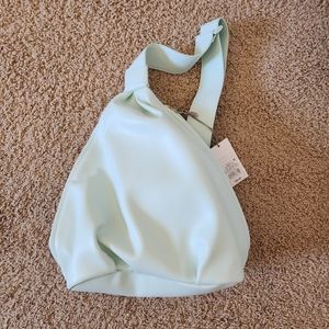 NWT mint green single strap faux leather backpack